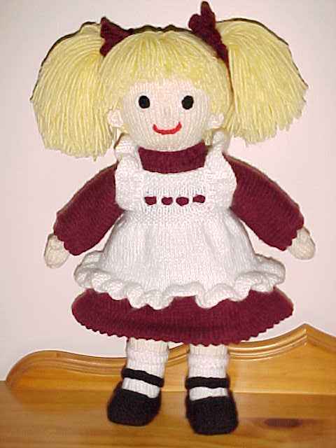 kırmızı beyaz elbiseli örgü oyuncak bebek modeli
